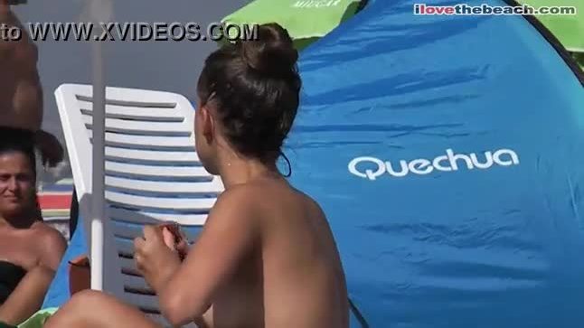 Spying busty teen at the beach